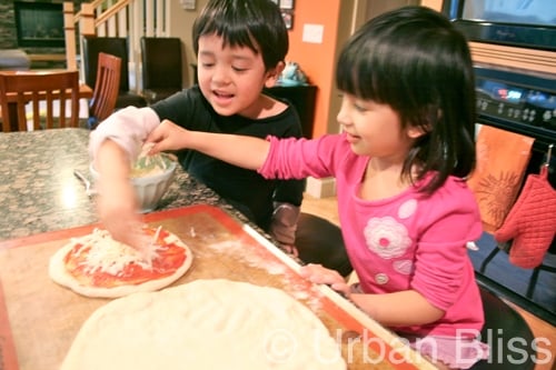 Top 10 kid-friendly kitchen tasks - topping pizzas