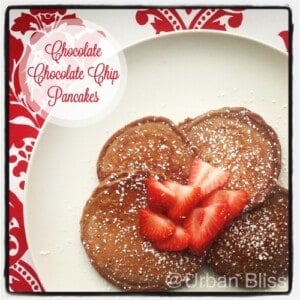 Chocolate chocolate chip pancakes are a decadent, delicious way to celebrate special mornings! Recipe on UrbanBlissLife.com