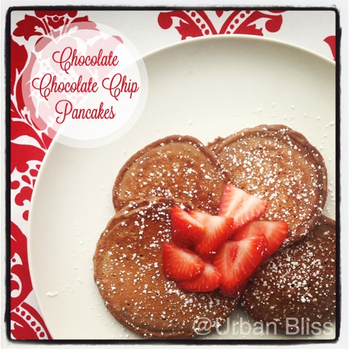 Chocolate chocolate chip pancakes are a decadent, delicious way to celebrate special mornings! Recipe on UrbanBlissLife.com