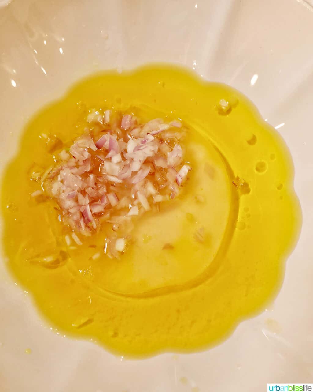 making the vinaigrette for baby potato salad with bacon