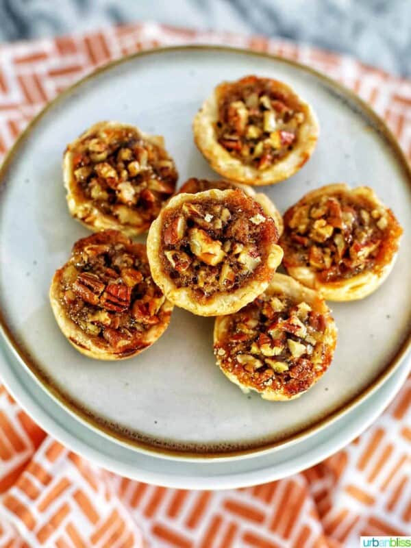 mini pecan pies centered on a plate