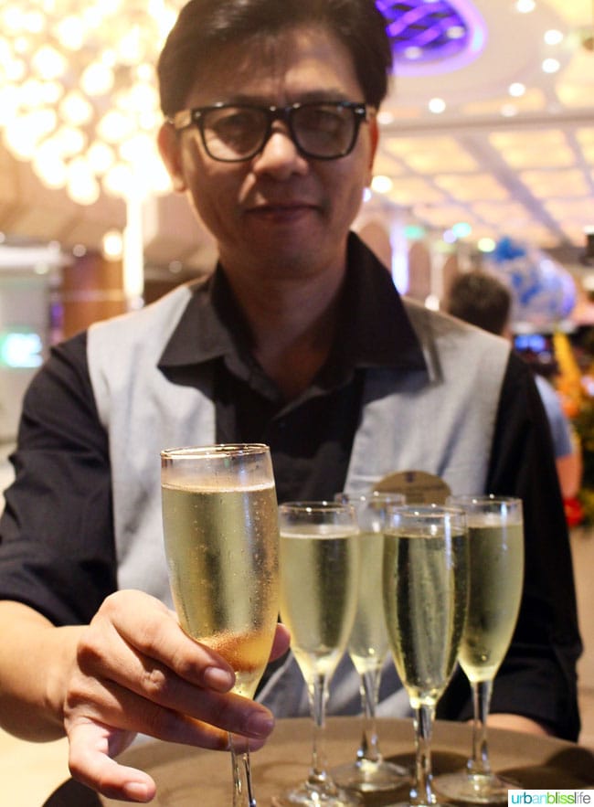 waiter with glasses of champagne