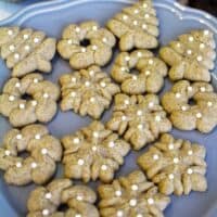 Cinnamon Christmas Spritz Cookies on a plate.