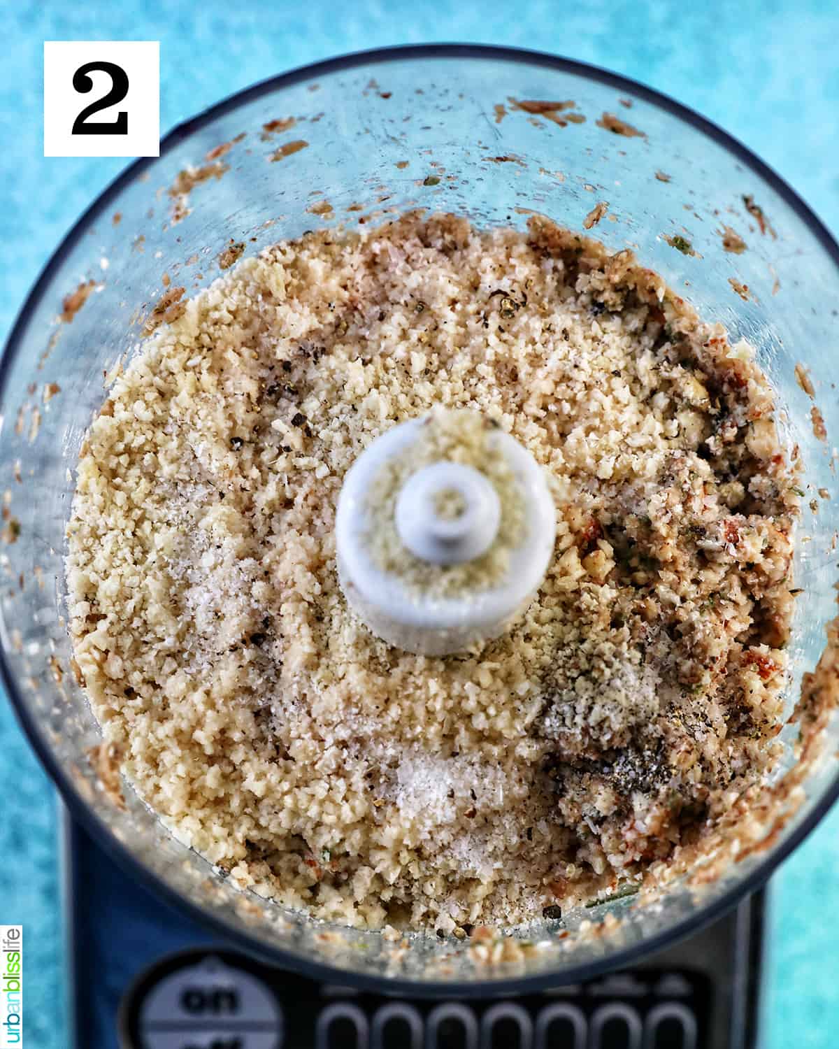 Filling ingredients well blended for Vegan Stuffed Mushrooms in a food processor.