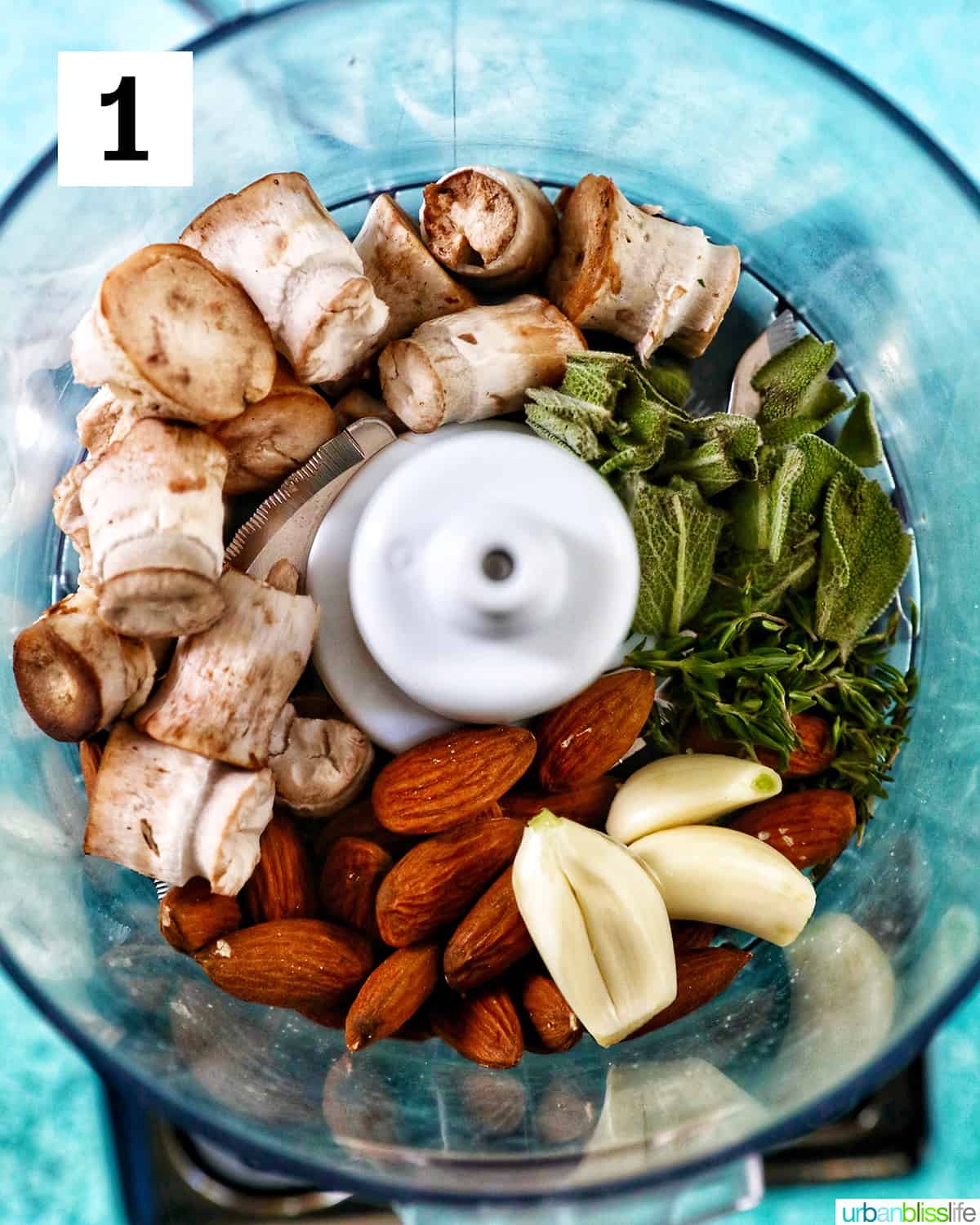 mushroom stems, almonds, herbs, and garlic in a food processor to make filling for mushrooms.
