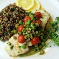 Wild Alaskan Halibut Poached with Tomatoes and Peas Wine Sauce, recipe on UrbanBlissLife.com