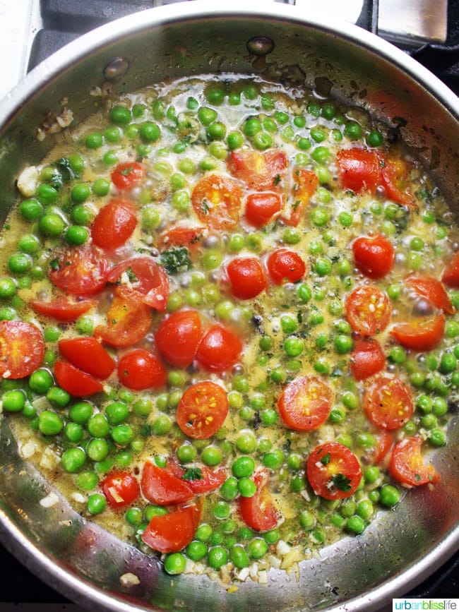Wild Alaskan Halibut Poached with Tomatoes and Peas Wine Sauce, recipe on UrbanBlissLife.com