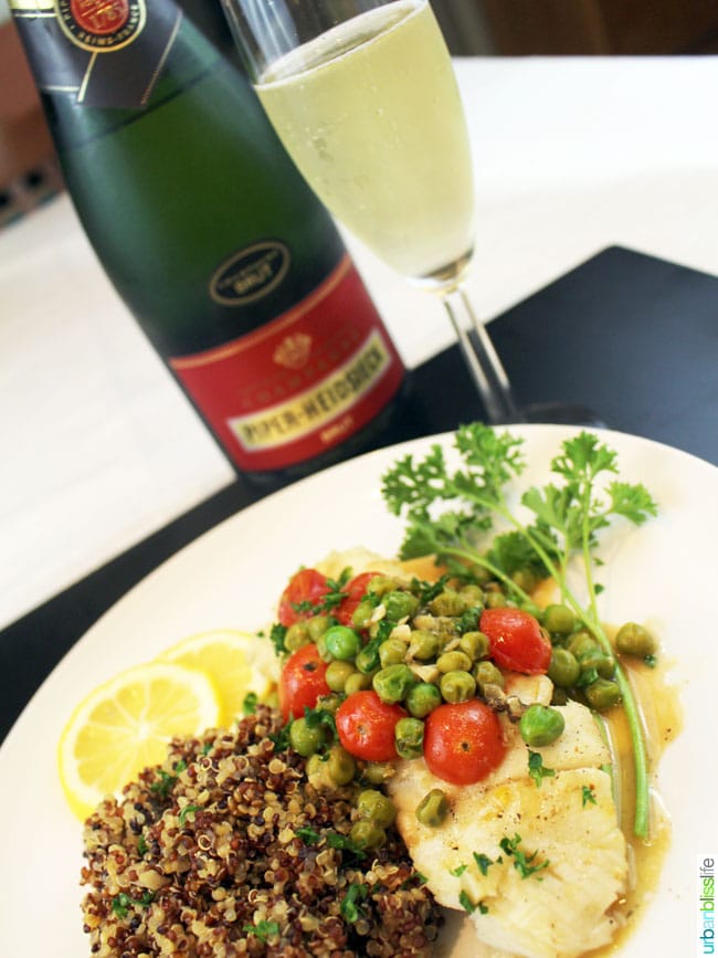 Wild Alaskan Halibut Poached with Tomatoes and Peas Wine Sauce, recipe on UrbanBlissLife.com