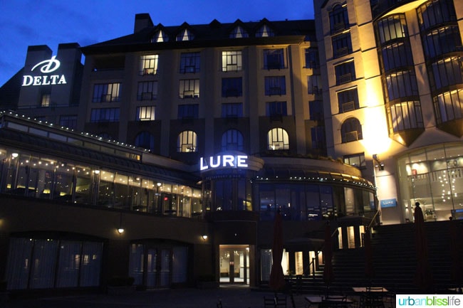 Lure Restaurant lit up at night, in Victoria British Columbia, Canada.
