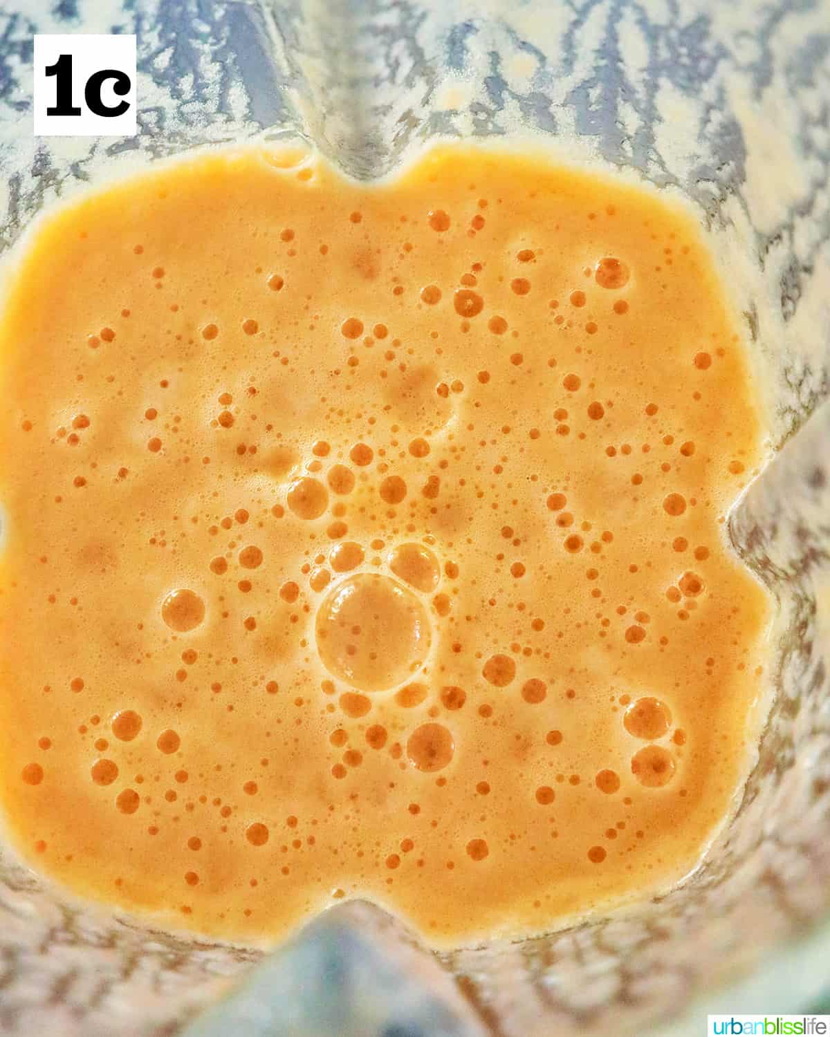 blended cantaloupe margaritas in a blender.