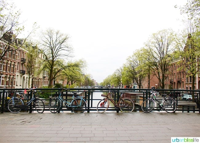Bikes on a Bridge over a Canal - 2 days in Amsterdam on UrbanBlissLife.com