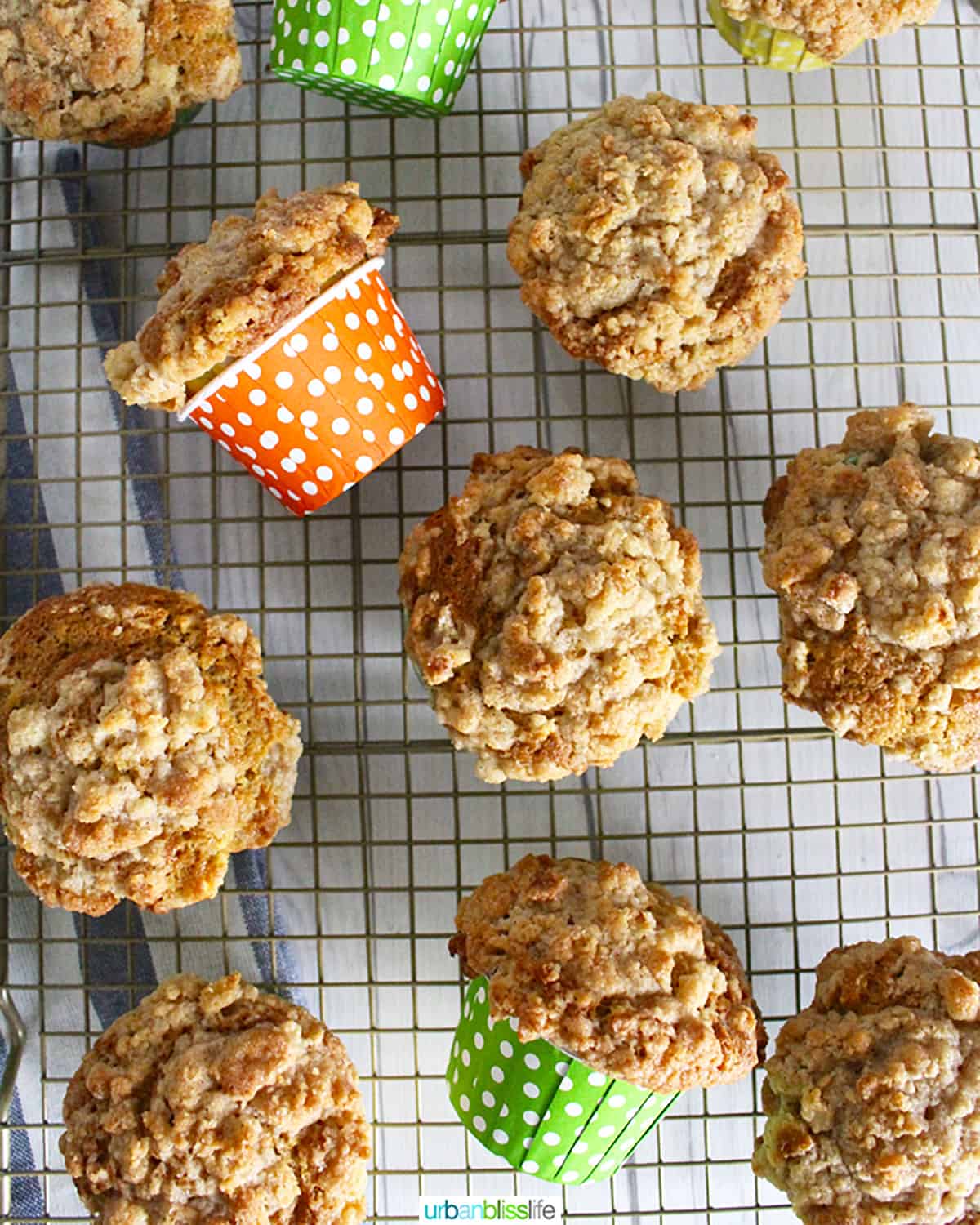 Cinnamon Streusel Muffins on a baking rack.