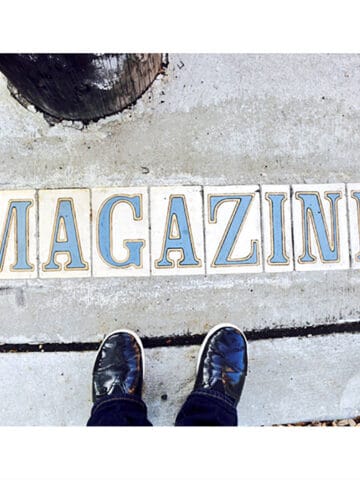 Magazine Street cement with shoes.
