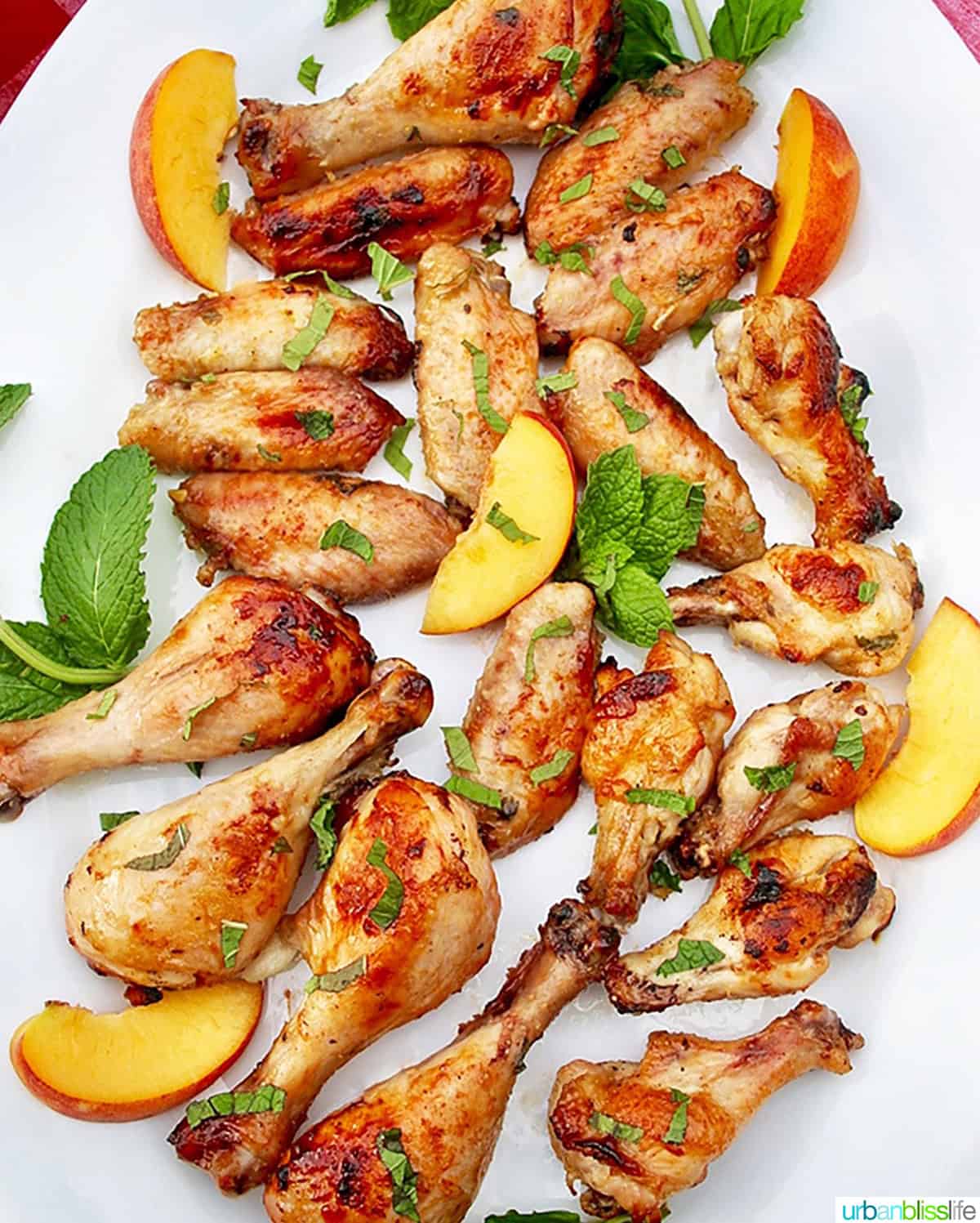 peach bourbon grilled chicken on a white plate