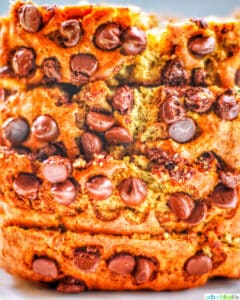stack of sliced chocolate chip banana bread with loaded chocolate chips.
