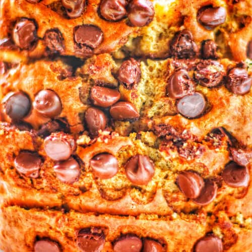 stack of sliced chocolate chip banana bread with loaded chocolate chips.