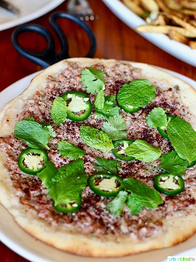lamb flatbread at Ray restaurant, Israeli cuisine in Portland, Oregon. Restaurant review on UrbanBlissLife.com