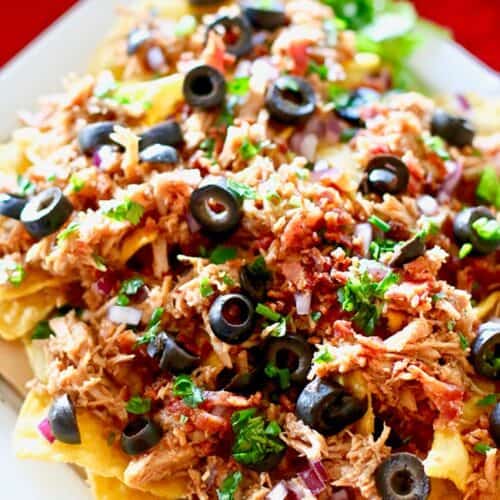 Slow Cooker Pulled Pork Nachos recipe on UrbanBlissLife.com