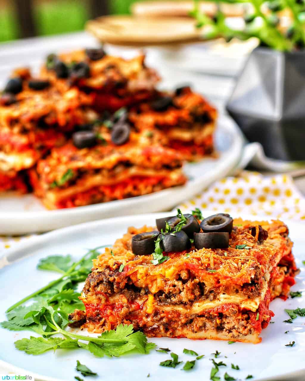 Mexican lasagna slice with more slices in the background