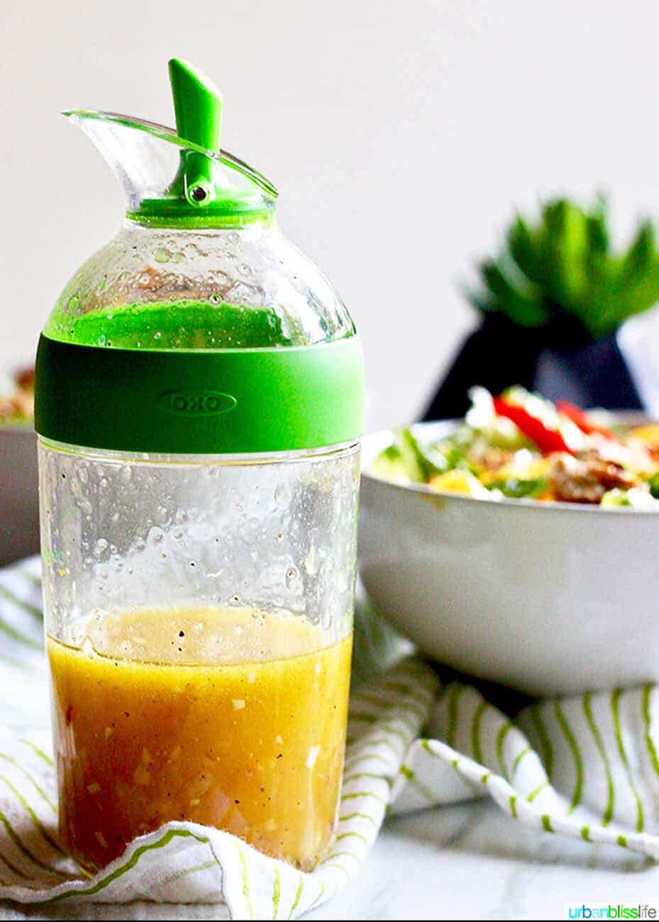 jar of honey orange dressing for salad.