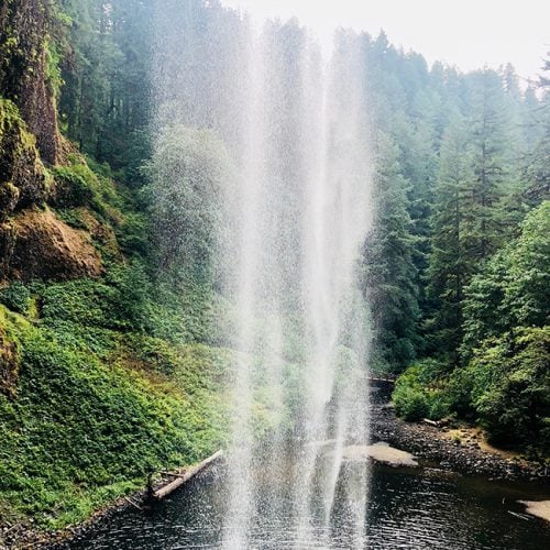 behind the waterfall at Silver Falls State Park