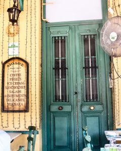 green door on storefront in Athens, Greece