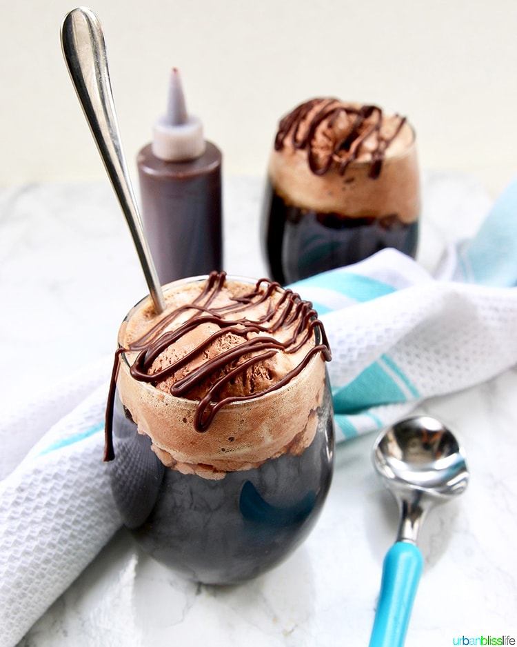 two Boozy Chocolate Peanut Butter Floats with syrup and scoop