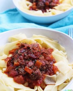 big bowls of Instant Pot Short Rib Ragu over pasta