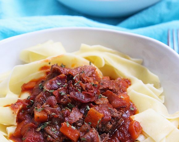 big bowls of Instant Pot Short Rib Ragu over pasta