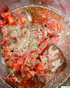 Instant Pot Short Rib Ragu tomatoes and herbs in Instant Pot