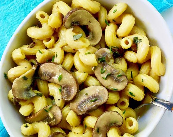 Creamy Vegan Mushroom Pasta in bowl with fork