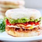 huevos rancheros breakfast sandwich on a plate.