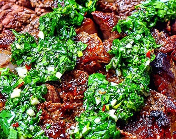 Cast iron rib eye steak with chimichurri sauce