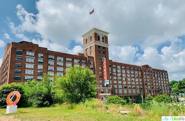 exterior of large Ponce City Market building.