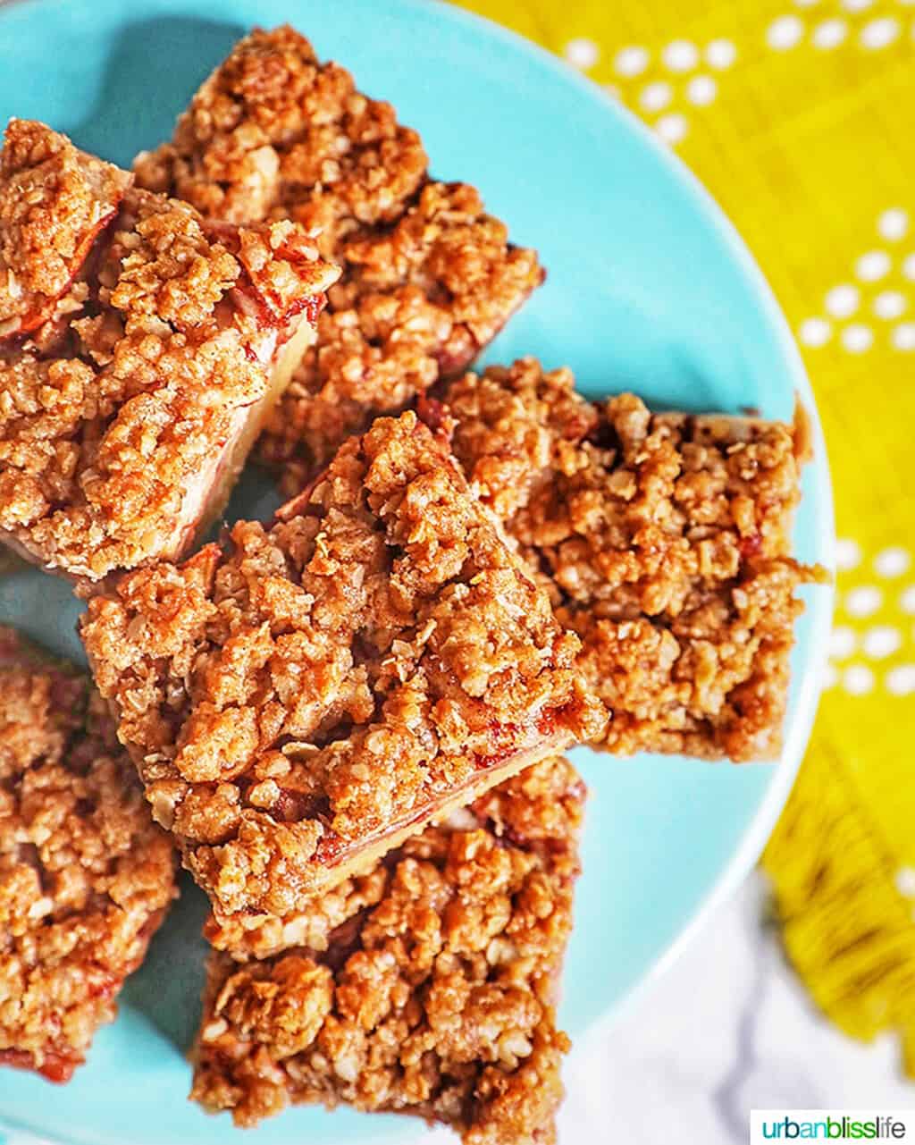 apple pie bars on blue plate
