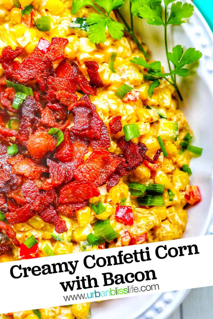 Creamy confetti corn in a white bowl with text overlay