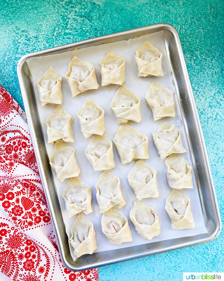 Pork and Shrimp Wontons on baking sheet