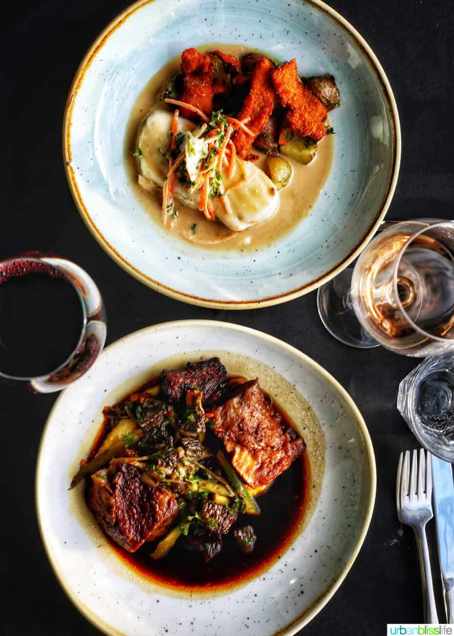 two plates of special occasion dining dishes at Le Pigeon restaurant in Portland, Oregon.