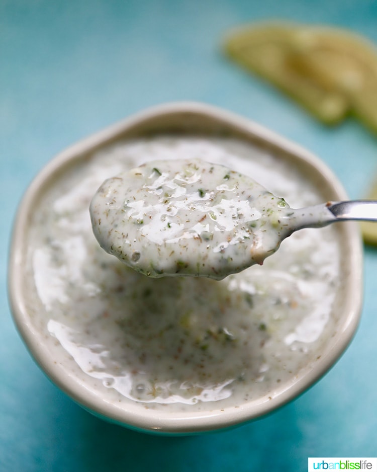 herbs mixing into vegan tzatziki