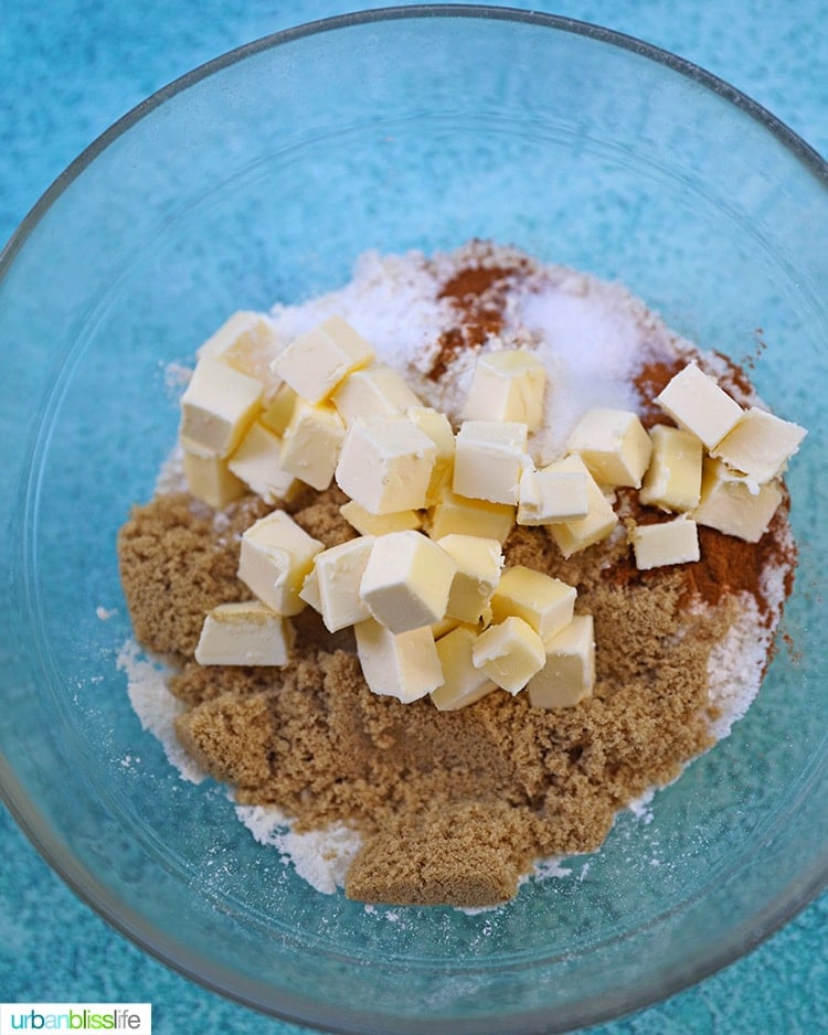 mixing together ingredients to make crumble topping