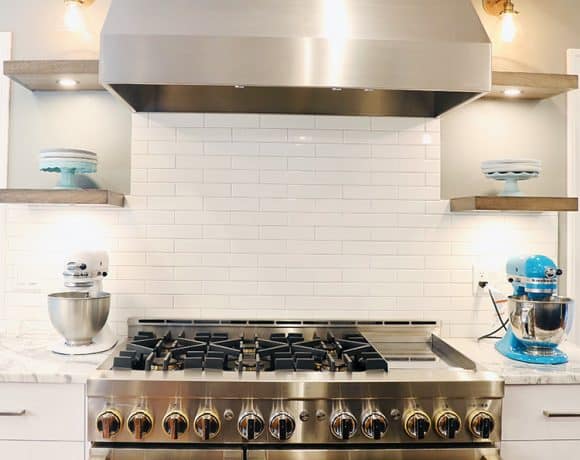 jennair range and custom hood floating shelves