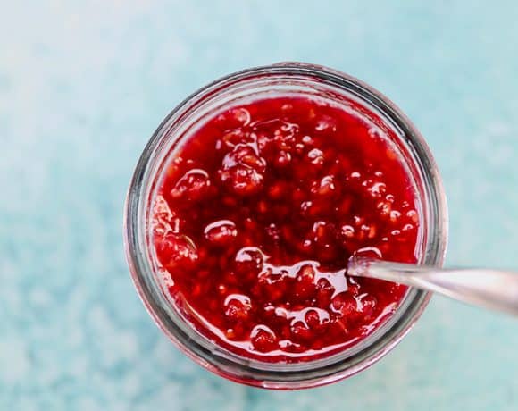 homemade raspberry jam in a jar