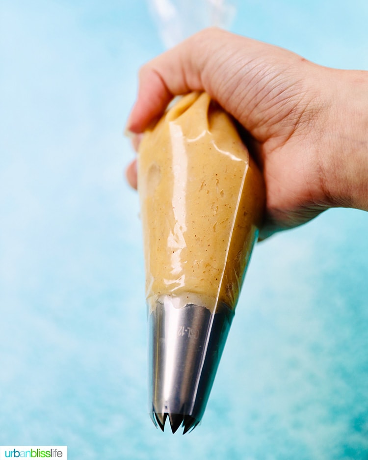 churro dough in pastry bag