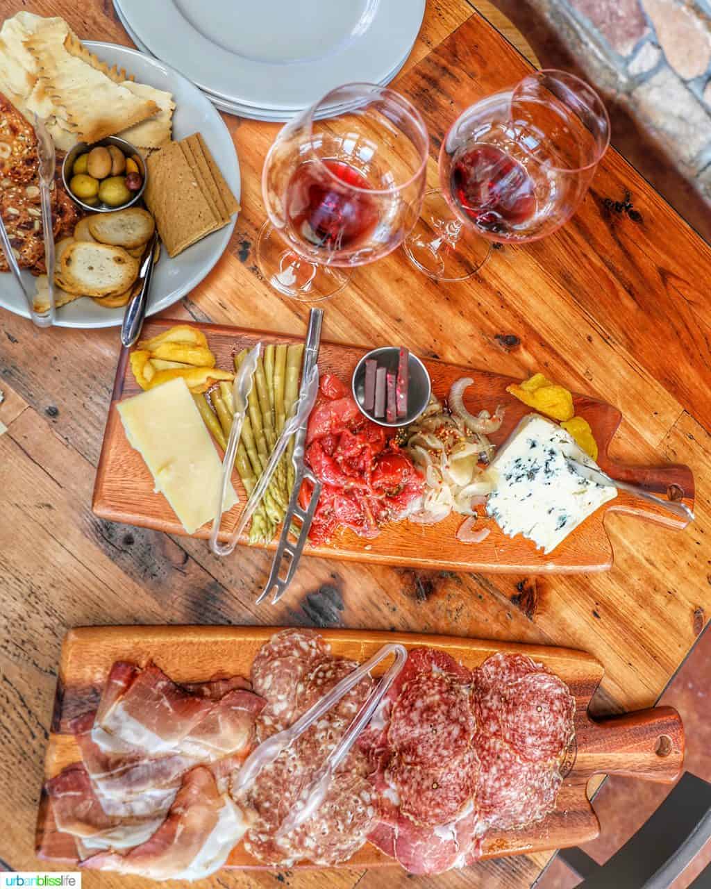 red wine glasses with charcuterie boards at Lenne Estate