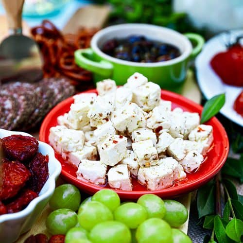 marinated feta as part of a spread with grapes