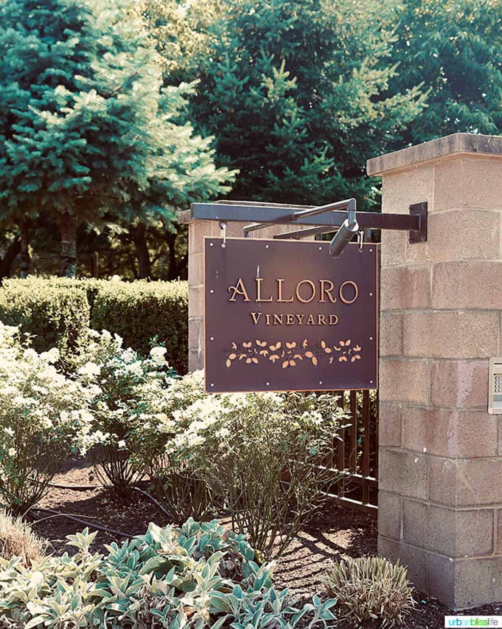 Alloro entrance sign