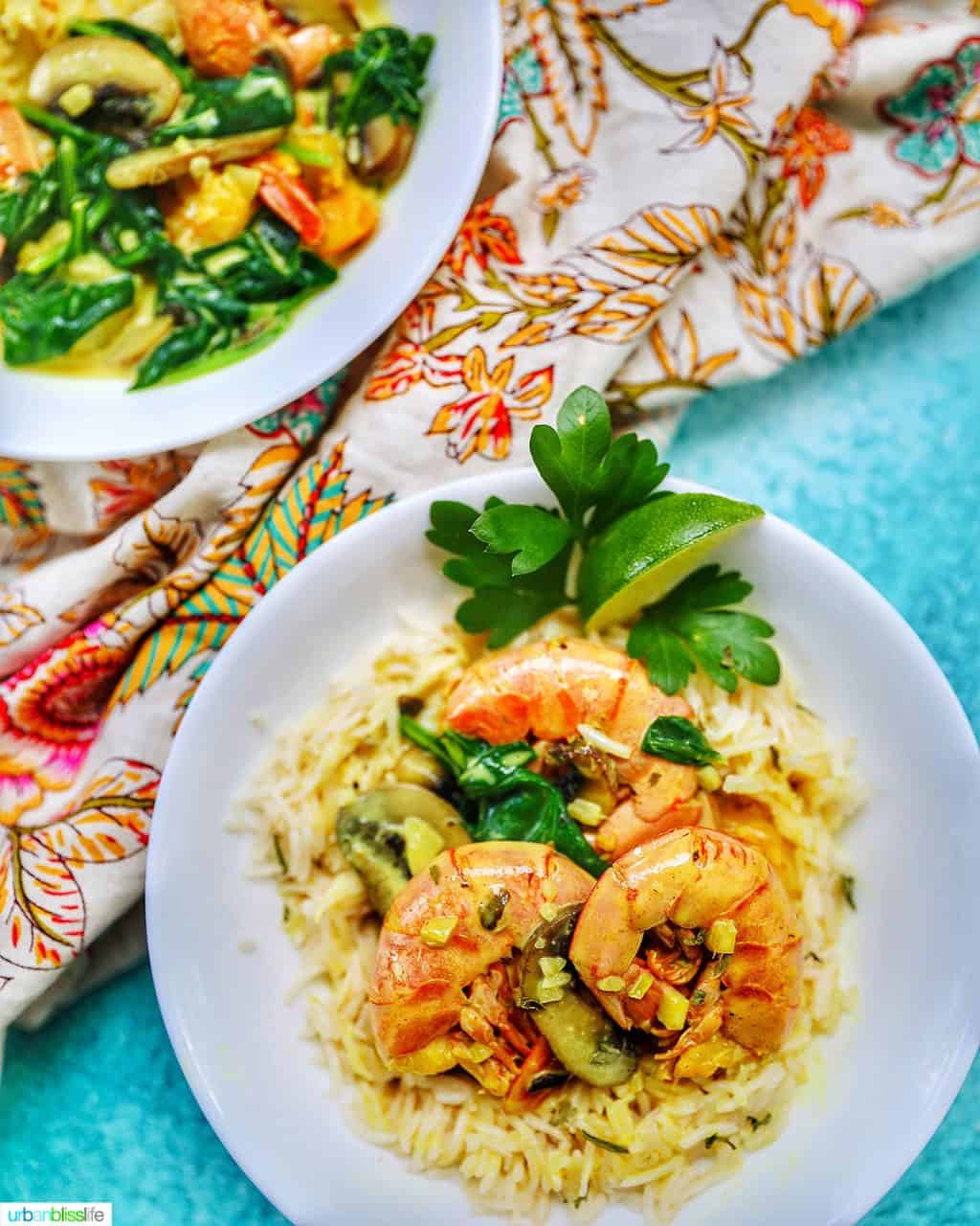 two bowls of Coconut Curry Shrimp and Mushrooms