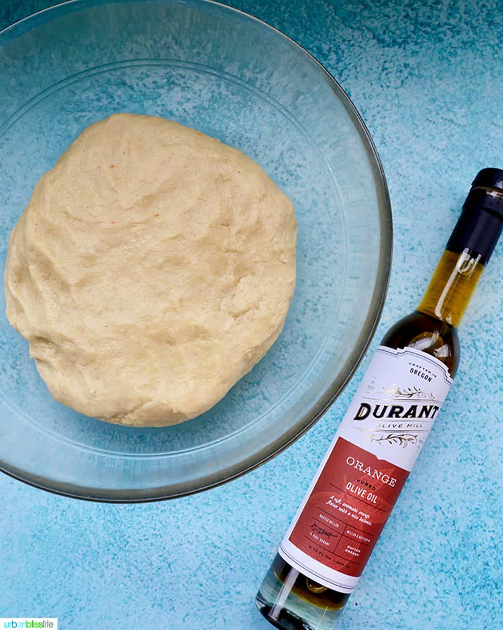 orange oilive oil with cinnamon roll dough