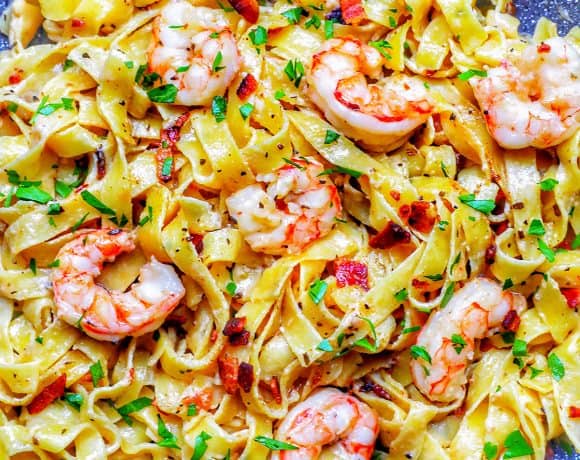 full photo of bacon shrimp pasta in pan