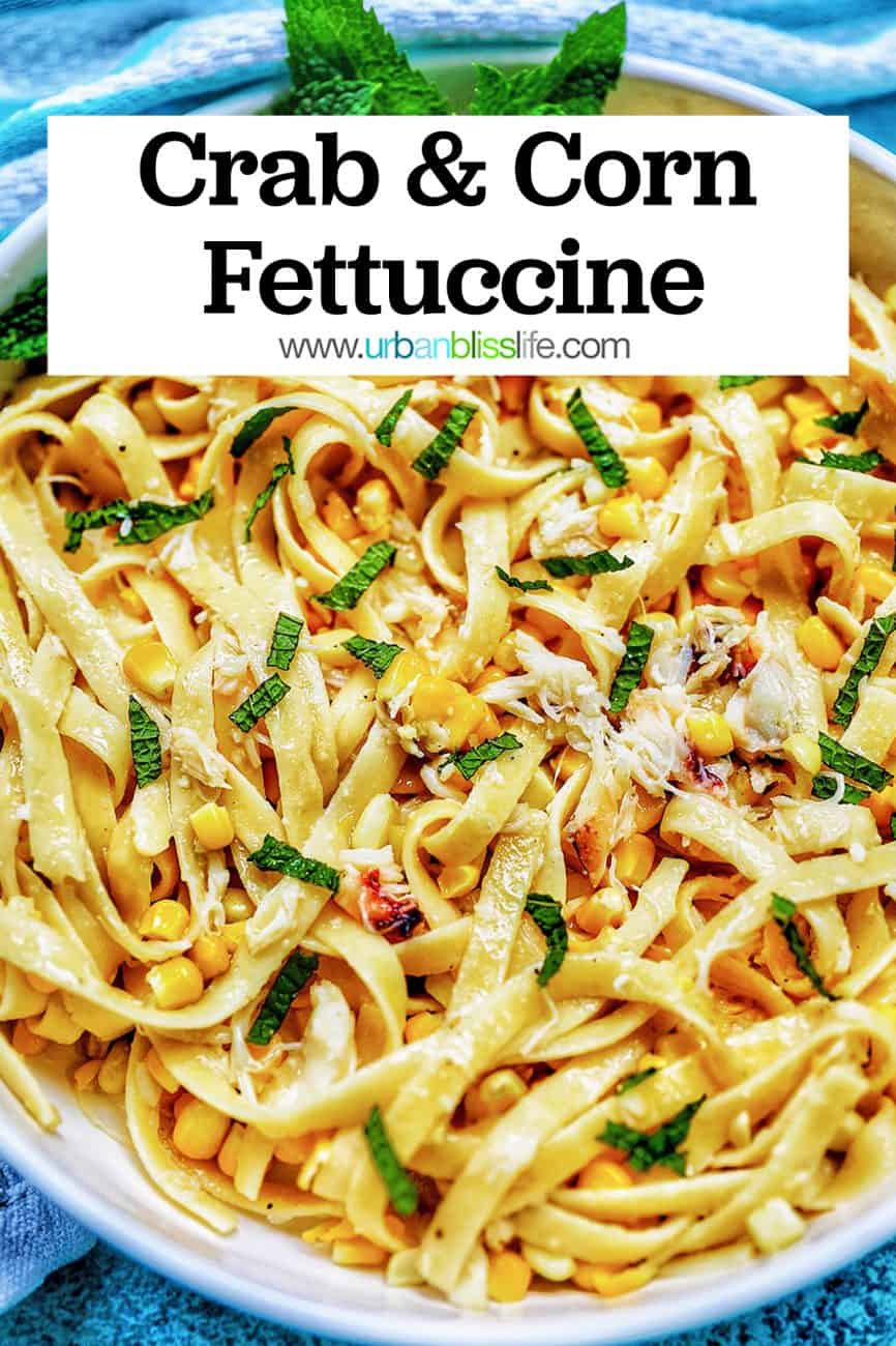 closeup of crab pasta with title text